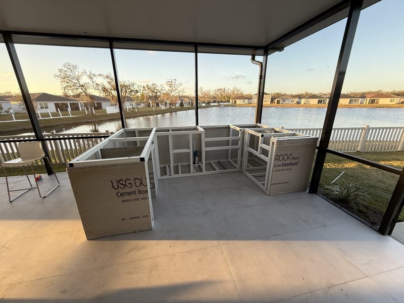 Screened patio outdoor kitchen framework during construction