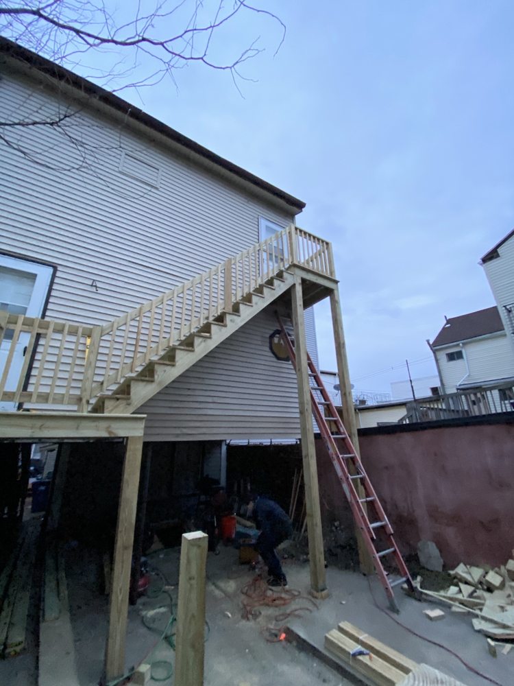 Raised deck and exterior stairs during construction