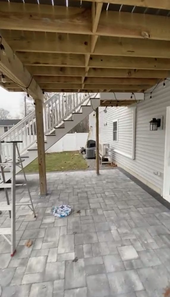 Exposed deck framing and posts during exterior construction