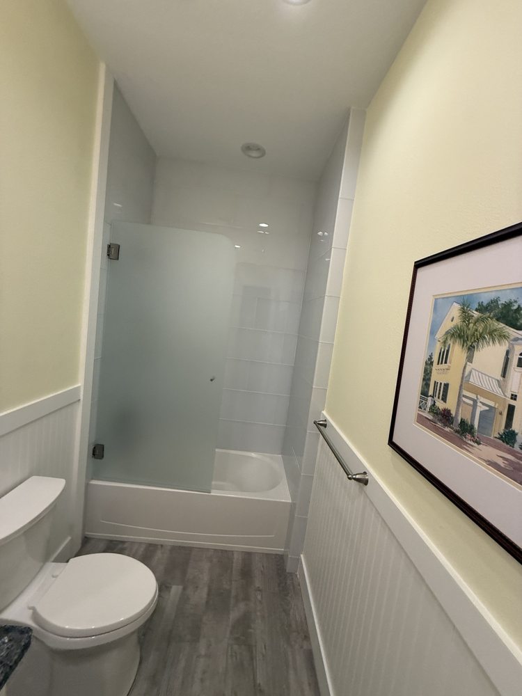 Bathtub and bathroom floor viewed from the entrance