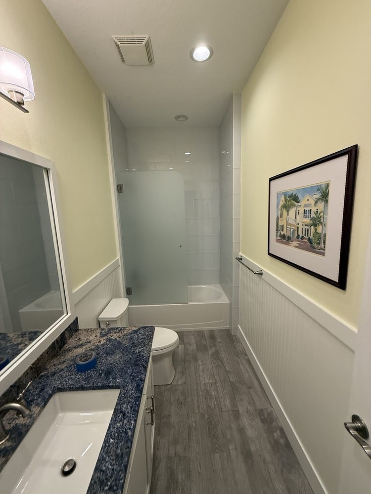 Bathroom vanity countertop and an adjacent bathtub