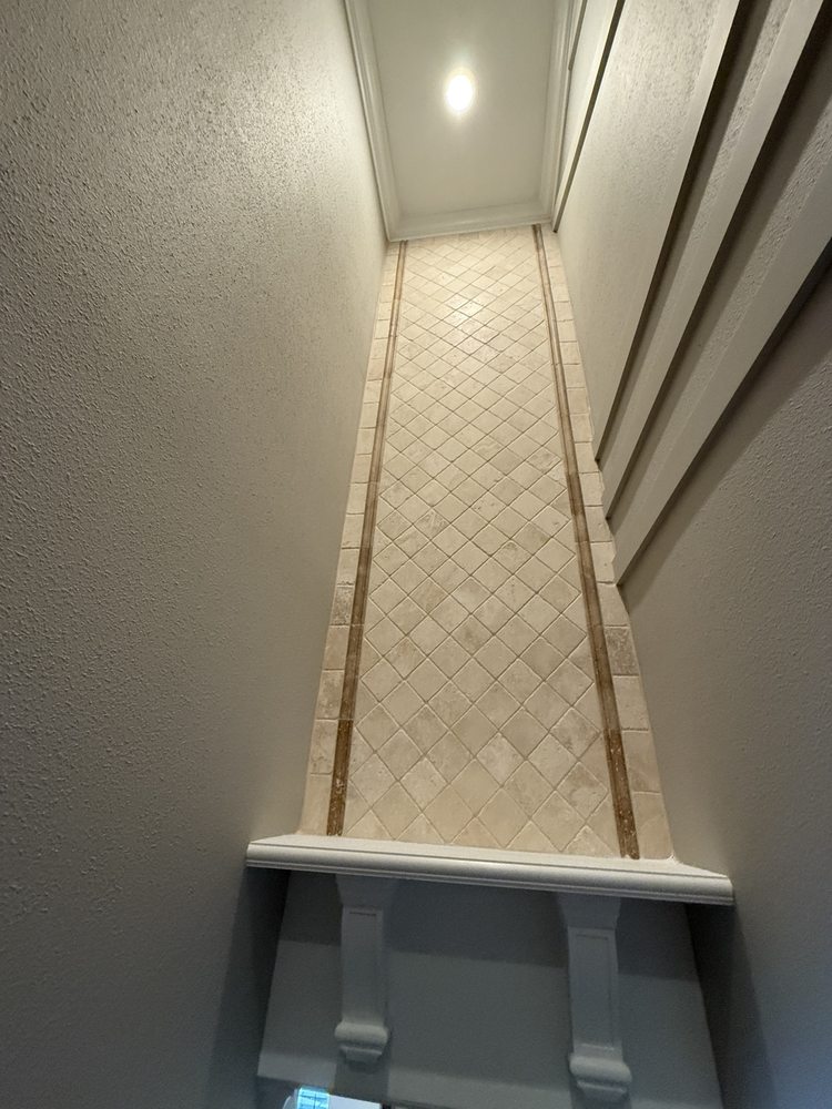 Original decorative tile panel before remodeling